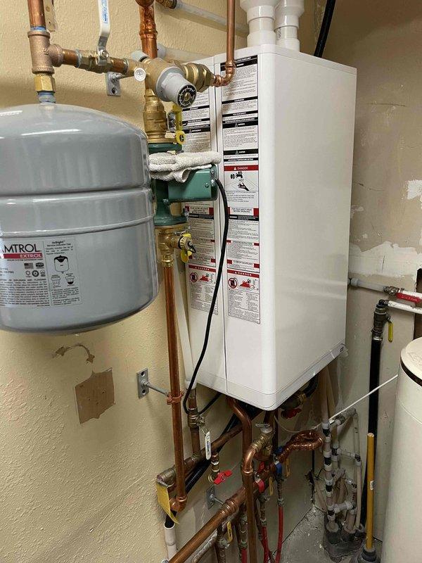 Performed complimentary tankless water heater descaling service and heat exchanger flush. System inspection revealed components in good condition. Discussed water treatment options with homeowner and scheduled water care advisor consultation for the following week.