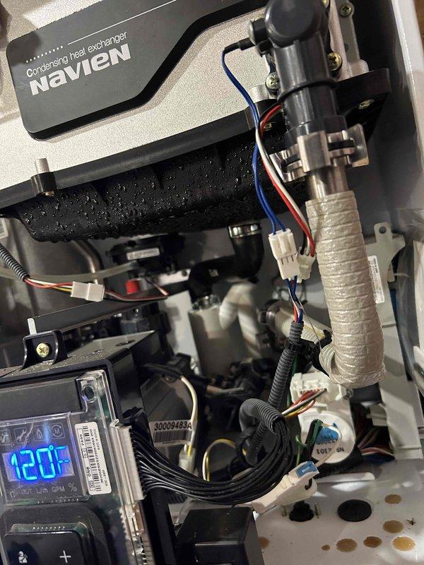 Performed annual tune-up maintenance on three Navien boilers (two in main residence, one in pole shed). Completed full system cleaning including inlet filter inspection on all units. Identified potential warranty issue with DHW boiler and documented with photos for Navien warranty claim submission. The remaining two boilers were confirmed operational and properly prepared for winter service.