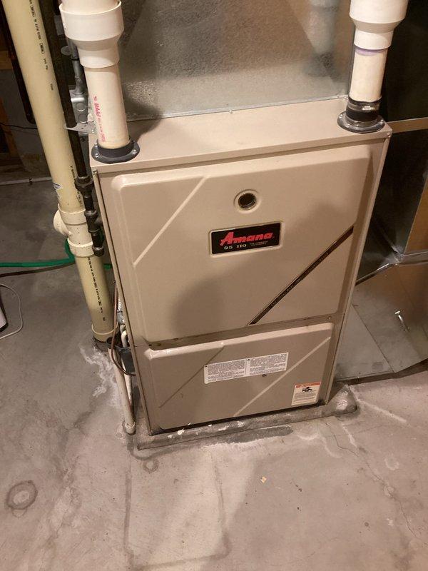 Performed inspection on 23-year-old Amana furnace that was not maintaining temperature. System safety and efficiency checks revealed heat exchanger in acceptable condition, but unit demonstrated inability to engage second stage operation even after manual jumpering. Customer elected to continue with single-stage operation for the time being.