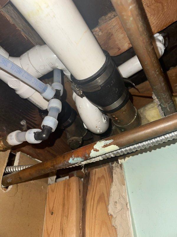 Responded to warranty call regarding leak at bathtub overflow connection installed during previous re-pipe service. Upon inspection, determined the overflow plate needed additional tightening. Successfully resolved the issue by properly securing the overflow connection, eliminating the leak.