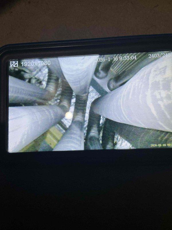 Performed comprehensive furnace tune-up service, addressing multiple maintenance issues. Cleaned rusty burners to improve combustion efficiency and recommended air cleaner installation to address airflow restrictions caused by inadequate filter size. Visual inspection of heat exchanger and ventilation system conducted with documentation via inspection camera.