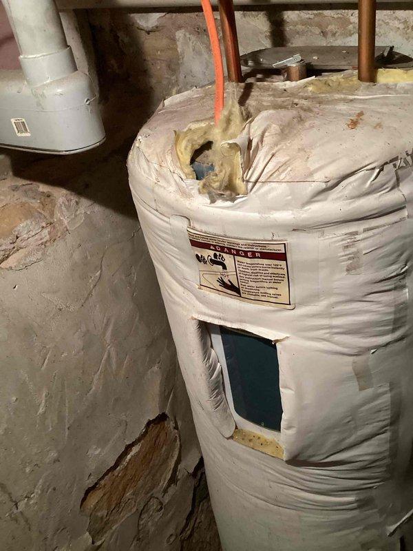 Installed new standard height toilet with round bowl. Replaced wax ring and bolts during installation. Completed basic installation according to industry standards.