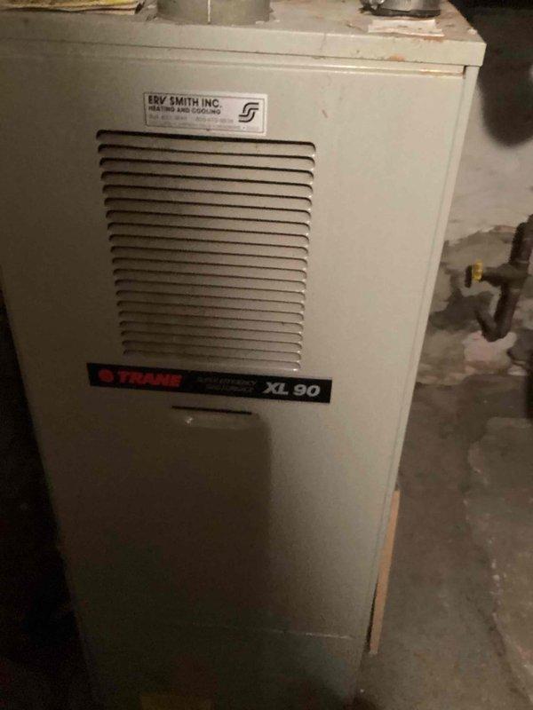 Installed new standard height toilet with round bowl. Replaced wax ring and bolts during installation. Completed basic installation according to industry standards.