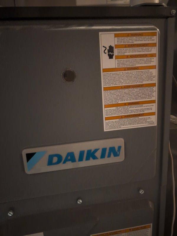 Diagnosed no-heat issue on 8-year-old Daikin furnace by identifying clogged pressure switch port on collector box. Performed remediation including port cleaning, drain flush, flame sensor cleaning, heat exchanger inspection, and burner check. Replaced burners as preventative measure due to debris accumulation in gas channel, ensuring proper ignition and system operation.
