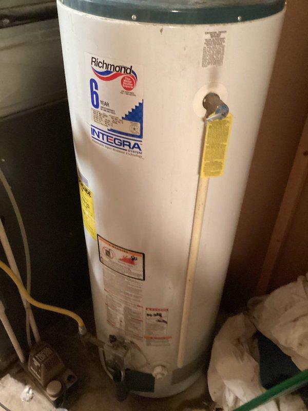 Responded to no heat call for aging furnace (10+ years old) that was cycling on but blowing cold air due to pilot light repeatedly extinguishing. Inspected heat exchanger and identified suspicious areas of potential deterioration. Cleaned flame sensor which temporarily resolved the immediate issue, allowing furnace to maintain operation. Noted that system never displayed error codes during flame sensor cycling, suggesting possible control board malfunction as secondary contributing factor.