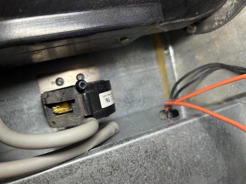 Responded to a no heat call where previous service had identified debris in pressure switch. Upon inspection, found additional debris buildup inside pressure switch port and exhaust ports. Cleared obstructions and verified furnace operation. Diagnosed weak flame signal indicated by flashing yellow light on control board. Determined igniter/flame sensor replacement needed, which will be ordered and installed on follow-up visit.