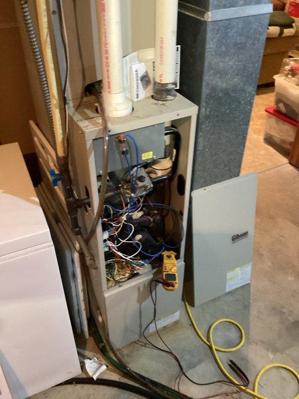 Responded to no-heat call for 21-year-old heating system. Discovered AC was simultaneously running with furnace due to significant nest obstruction in outdoor unit. Performed comprehensive inspection of furnace heat exchanger, evaporator coil, and condensing unit, identifying issues with burners requiring replacement. Left repair recommendations and scheduled follow-up consultation.