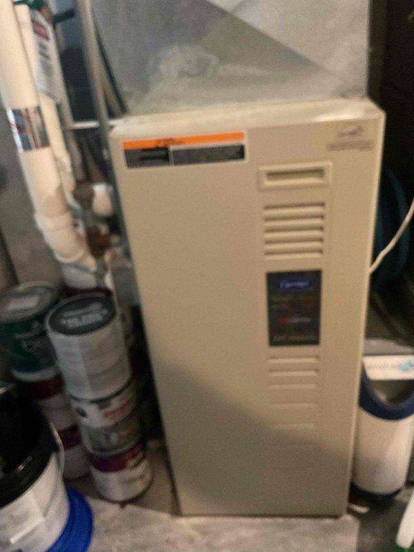 Responded to no heat call for 20+ year old natural gas furnace. Diagnosed clogged secondary heat exchanger causing unit to fire briefly before shutting down. Observed significant dust buildup on heat exchanger coils affecting system efficiency. Replaced secondary heat exchanger to restore proper heating function.