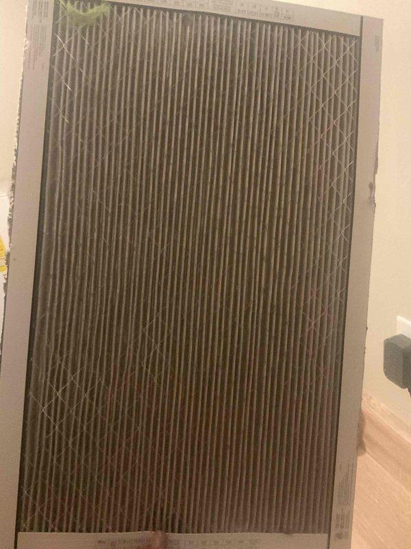 Responded to no heat complaint at residential property with 25-year-old furnace system. Diagnostic inspection revealed severely clogged air filter with additional broken metal filter impeding proper airflow. Removed damaged metal filter component and replaced standard air filter, restoring system operation and proper heat distribution.