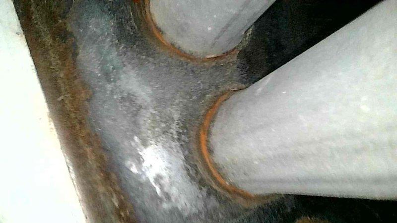 Responded to no heat complaint at residential property with 25-year-old furnace system. Diagnostic inspection revealed severely clogged air filter with additional broken metal filter impeding proper airflow. Removed damaged metal filter component and replaced standard air filter, restoring system operation and proper heat distribution.