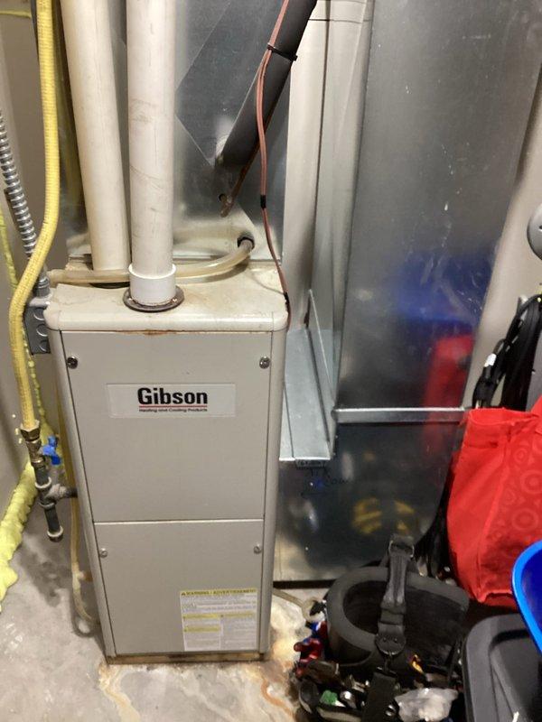 Responded to no-heat complaint for a 2011 Gibson furnace system. Diagnosed weak airflow issue and identified an ultrasonic humidifier filter that was impeding proper operation. Customer replaced filter which restored normal heating function. Installed a simple thermostat and recommended routine furnace maintenance to maintain system performance.