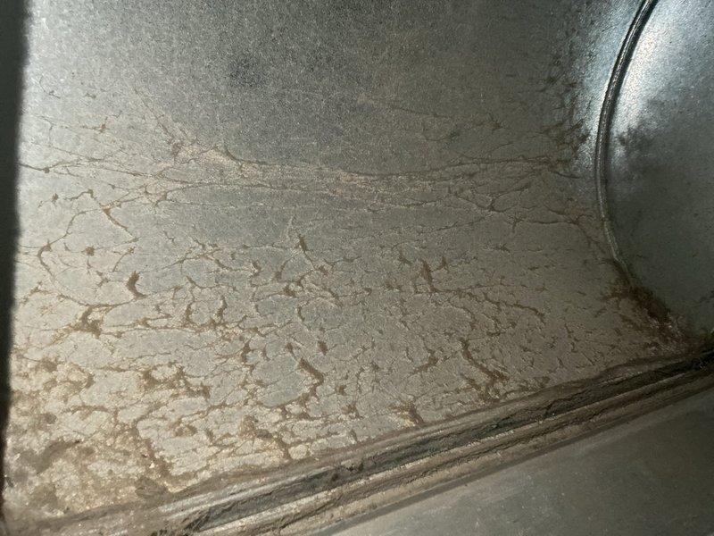 Performed furnace tune-up and inspection on 12-year-old natural gas unit. Found filter installed backwards, corrected orientation. Identified blower motor making loud noise during startup/shutdown, indicating potential failure. Discovered critical safety hazard: cracked heat exchanger above high limit switch causing carbon monoxide leakage. Condemned unit as unsafe to operate. Scheduled same-day estimate for furnace replacement.