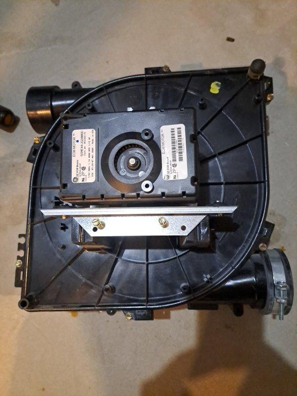Responded to no-heat service call. Upon inspection, identified failed draft inducer motor assembly as source of heating failure. Removed and replaced defective inducer assembly. Documented replacement with photos of component. Customer had initially requested full furnace replacement; however, repair of inducer motor resolved the immediate issue. Discussed options with customer and arranged for service advisor follow-up for potential system upgrade evaluation.