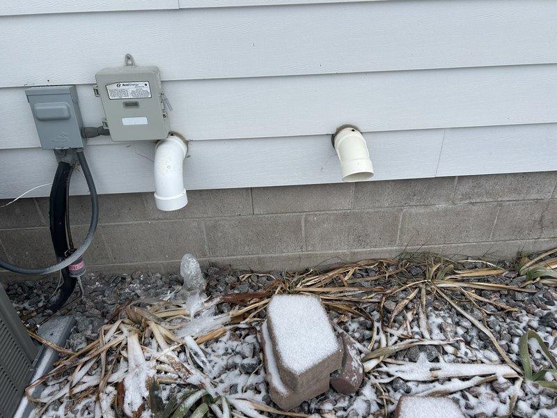 Responded to no heat service call for Lennox furnace. Diagnosed multiple issues: intake pipe frosted due to improper vent termination and air filter severely clogged with white dust from humidifier. Cleared frost from intake, removed obstructed filter, and reset furnace to restore heat. Submitted correction form for installation team to properly terminate venting system.