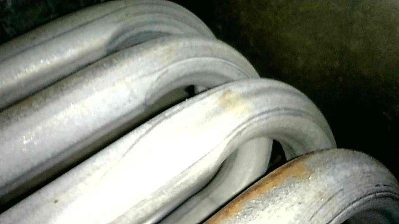 Responded to no-heat call for 12-year-old furnace that was blowing cold air with pressure switch error code. Diagnosed primary issue as tripped limit switch due to plugged air filter. Reset limit switch and discovered sock lodged in blower assembly near heat exchanger, which was removed after pulling the blower. Inspection revealed heat exchanger showing significant wear - no immediate holes or cracks detected but system is approaching end of service life. Customer advised of findings and scheduled follow-up consultation.