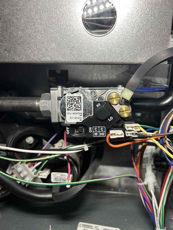 Performed comprehensive furnace tune-up on unit installed approximately one year ago. Inspection included heat exchanger integrity check, combustion analysis testing, gas pressure verification (high/low stage), examination of flame sensor and burners, and blower motor assessment. All components functioning properly with no immediate concerns noted; air filter in moderate condition, pressure switch cleaned, and thermostat operation verified.