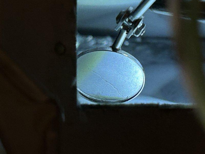 Diagnosed a non-functioning furnace (10 years old) with a code 33 error indicating closed limit switches. Inspection revealed a cracked heat exchanger, confirmed visually with inspection mirror. Due to safety concerns with the compromised heat exchanger, system was left non-operational. Provided customer with repair estimates and scheduled follow-up for complete system replacement options.