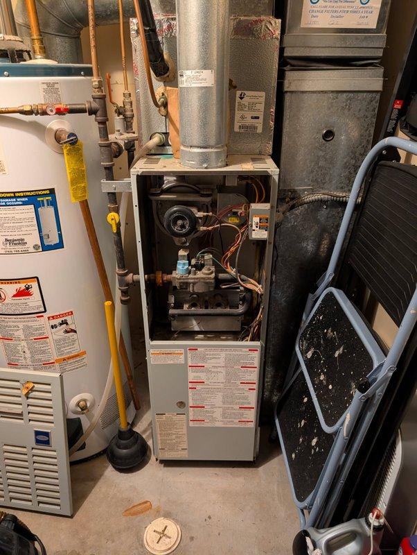 Diagnosed a non-functioning furnace (10 years old) with a code 33 error indicating closed limit switches. Inspection revealed a cracked heat exchanger, confirmed visually with inspection mirror. Due to safety concerns with the compromised heat exchanger, system was left non-operational. Provided customer with repair estimates and scheduled follow-up for complete system replacement options.
