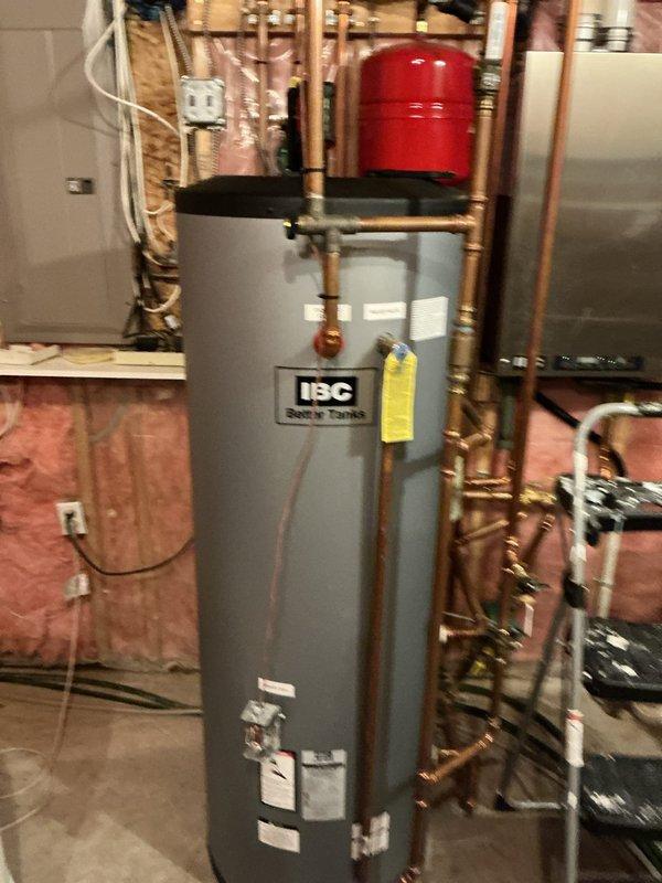 Diagnosed inadequate hot water temperature in IBC indirect water heater system. Identified faulty check valve by mixing valve causing temperature fluctuations from hot to lukewarm. Ordered replacement check valves (2) for the domestic side of boiler near mixing valve to restore proper operation.