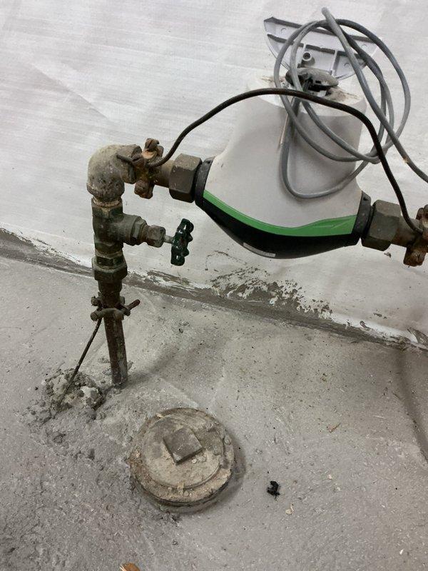 Relocated exterior hose bibb per customer request, requiring modification of supply piping in basement. Work involved installing new pipe assembly with shutoff valve through foundation to properly position the outdoor faucet at the desired location.