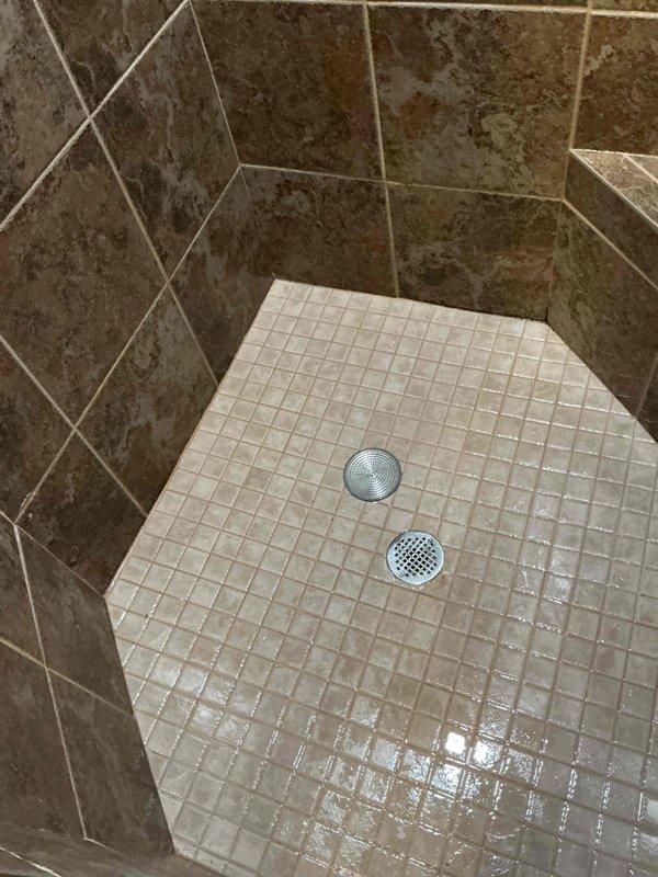 Successfully cleared a clogged shower drain in the upstairs bathroom by using a snaking technique. Upon inspection, the shower drain plug was identified as the source of the drainage issue, and proper snaking procedures were performed to restore normal water flow.