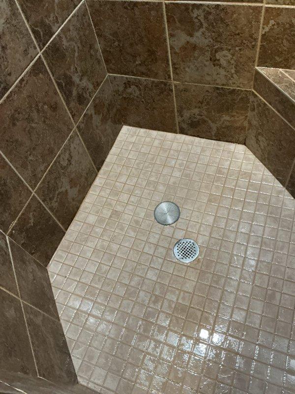 Successfully cleared a clogged shower drain in the upstairs bathroom by using a snaking technique. Upon inspection, the shower drain plug was identified as the source of the drainage issue, and proper snaking procedures were performed to restore normal water flow.