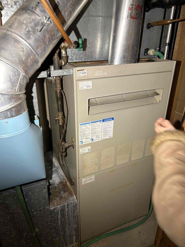 Diagnosed no-heat complaint on aging Lennox furnace. Inspection revealed faulty ignition control unit as root cause. Documented system condition with photos and prepared parts list for replacement components pending customer approval.