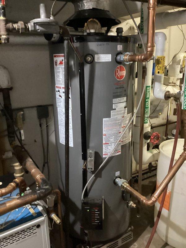 Responded to no-heat complaint in Unit 108 located at end of boiler distribution system. Diagnosed restricted flow issue in radiator piping. Drained approximately two gallons of contaminated water from system via existing drain valve, which restored proper circulation. Replenished system water level after draining. Verified heating function restored to apartment. Maintenance staff confirmed this is a recurring issue requiring periodic flushing of this terminal section of the distribution system.