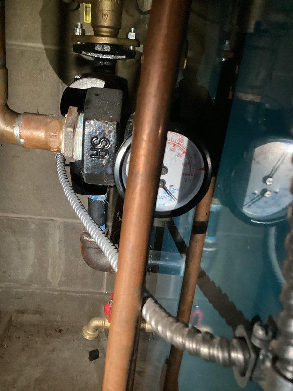 Diagnosed radiant heating system with no heat condition. Found boiler system was low on water, causing operational failure. Filled boiler system to proper pressure, bled air from lines, and restored normal heating function. Educated customer on manual water fill and air bleeding requirements for this particular boiler configuration.