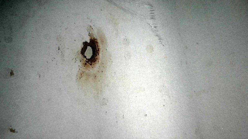 Responded to no heat service call for 12-year-old natural gas furnace experiencing short cycling. Diagnostic inspection revealed furnace would operate briefly then shut down. Visual examination identified critical failure: heat exchanger with visible hole/burn through, confirmed by photographic documentation. Equipment red-tagged due to safety hazard. Arranged emergency service priority and completed necessary documentation for heat exchanger replacement.