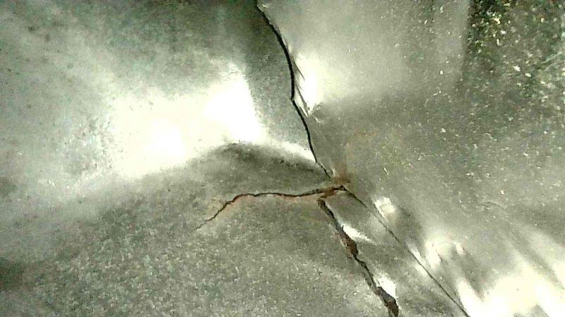 Responded to no-heat call for new homeowner reporting unusual humming noise from furnace with no visible pilot light. Upon inspection, identified a significant crack in the heat exchanger, which was documented with detailed photos. Provided customer with heat exchanger replacement options and scheduled follow-up appointment for complete system replacement quote.