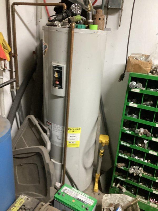 Diagnosed 14-year-old GeoComfort heat pump system that was not heating or cooling and tripping breaker. Inspection revealed compressor shorted to ground. Prepared estimate for complete replacement of compressor assembly including new compressor, wiring harness, capacitor, contactor, and TXV with dryer.