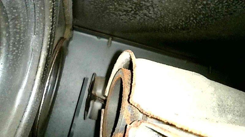 Responded to no heat call for 1-year-old natural gas furnace. Diagnosed limit switch fault code; found limit switch stuck open despite cool system. Observed heat exchanger was in good condition, but discovered Merv 13 filter clogged with white residue from ultrasonic humidifier. Replaced faulty limit sensor and air filter, restoring normal operation. Advised customer about humidifier options and recommended using distilled water if continuing ultrasonic humidifier use.