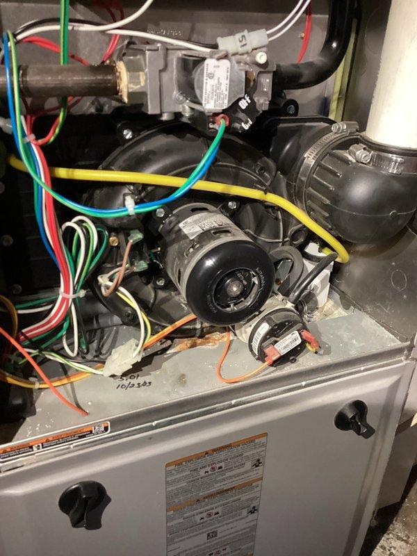 Responded to no-heat service call for an older oil furnace. Upon arrival, unit was operational with all components appearing to be in good working condition. Conducted thorough inspection of system including blower motor assembly and humidifier installation. Unable to replicate reported issue during visit; suspect possible intermittent transformer malfunction but deferred replacement pending observation of actual failure.