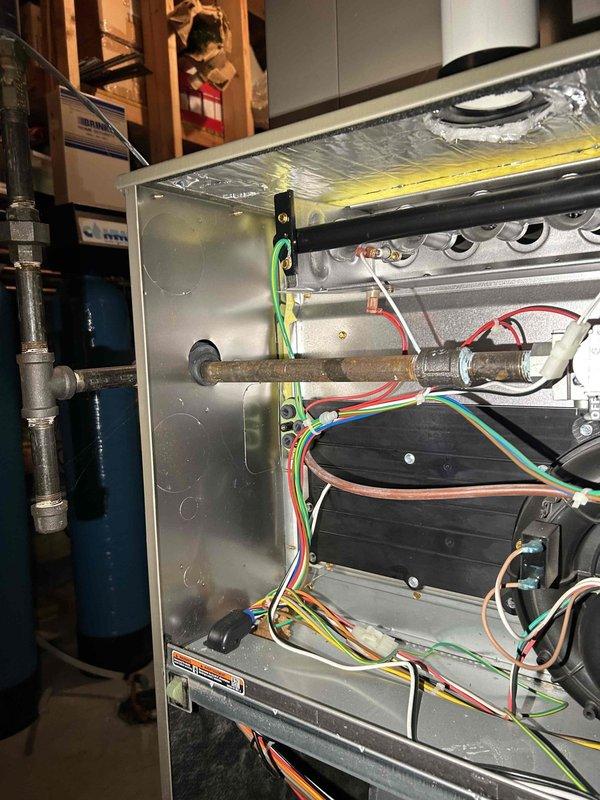Performed comprehensive furnace tune-up on 7-year-old unit. Adjusted gas train pressure from 3.72 inWC to 3.50 inWC, cleared debris and spiderwebbing from condensate drain line and trap. Verified proper operation of inducer motor, pressure switch, control board connections, and thermostat. Combustion CO measured at 19 ppm, with filter in moderate condition. System functioning normally with no immediate concerns.