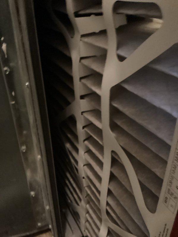 Performed comprehensive tune-up on two 18-year-old furnaces prior to home sale. First unit inspection included component cleaning, condensate drainage verification, and heat exchanger examination which revealed concerning spots (non-compromised); system demonstrated proper operation with 55° temperature rise. Second furnace required thorough condensate line cleaning due to significant blockage; heat exchanger inspection also revealed concerning areas. Homeowner was informed about age-related wear on both units and plans to explore replacement options through home warranty program.