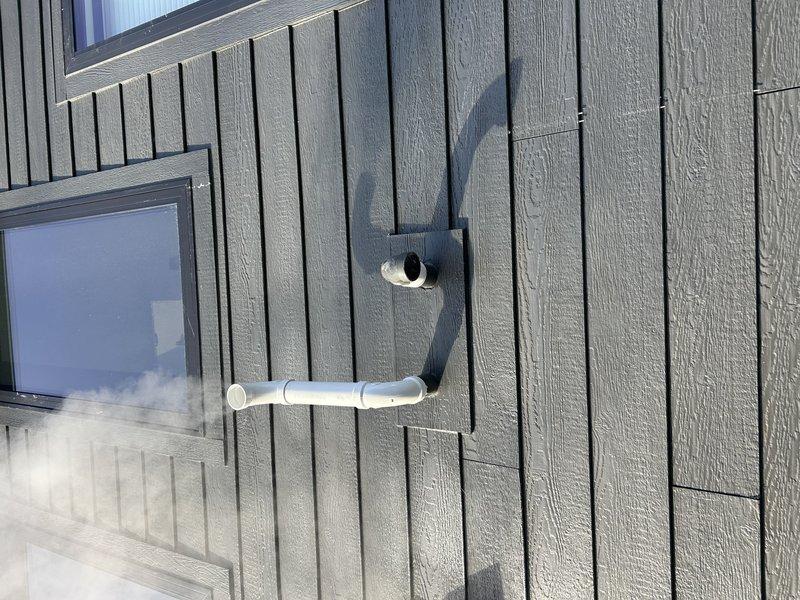 Responded to no heat call for 2-year-old Lennox furnace. Diagnosed intake frost blockage and improper exhaust termination as root causes. Cleared frozen intake and corrected exhaust pipe positioning, restoring proper operation and heat to the residence.