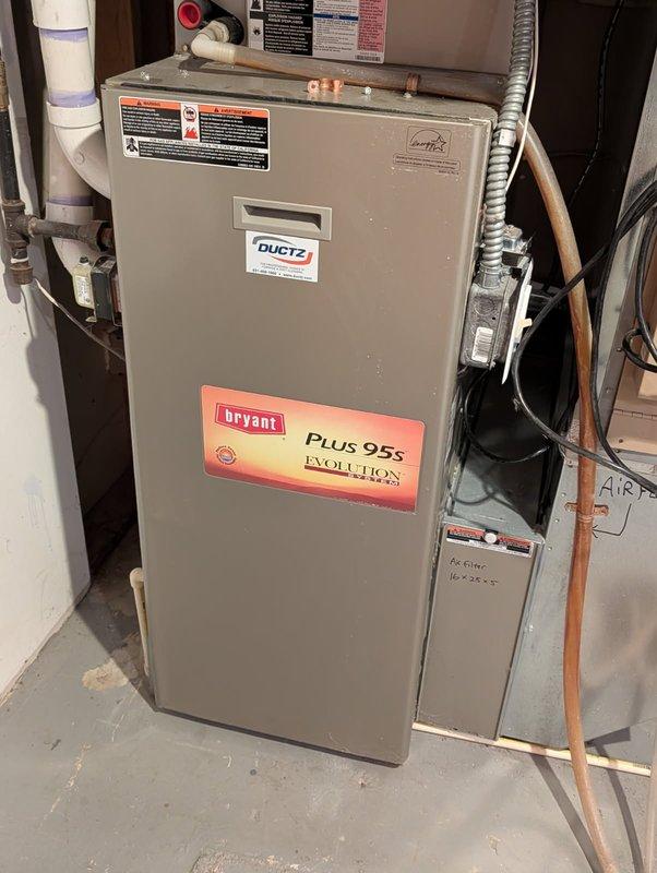 Performed diagnostic assessment on 16-year-old Bryant Plus 95s Evolution furnace experiencing no heat condition. Identified tripped flame rollout switch caused by failed secondary heat exchanger. Inspection revealed heat exchanger rusted through from inside out, leaking carbon monoxide. System deemed unsafe to operate due to critical safety hazard. Scheduled same-day estimate for replacement unit.