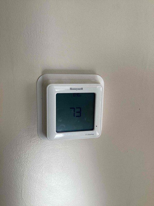 Replaced non-connecting Honeywell Pro Series thermostat with new unit after troubleshooting connection issues. Successfully established internet connectivity, allowing customer to control heating system via mobile device as requested. System now functioning properly with heat cycling as intended.