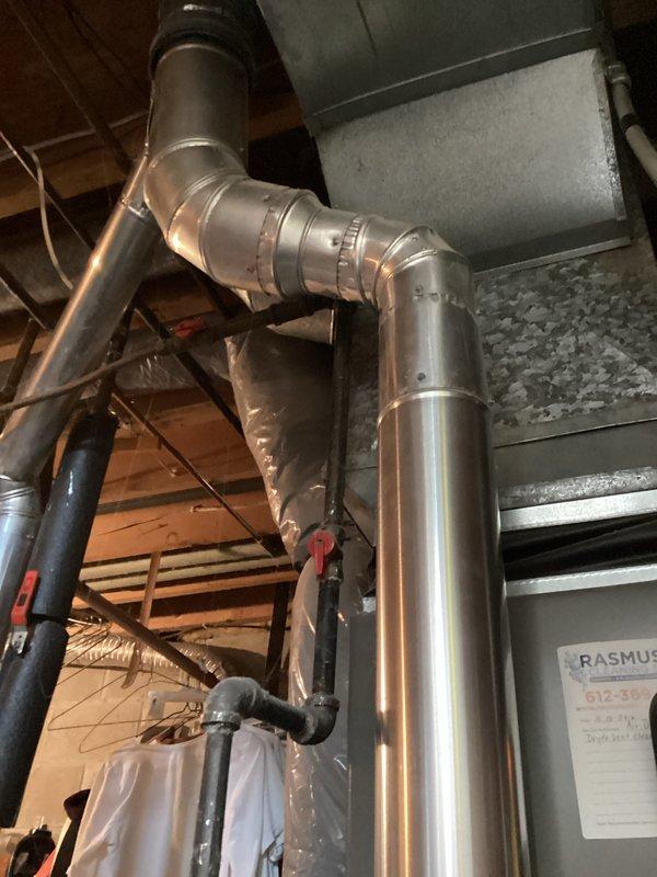 Performed scheduled furnace tune-up maintenance on aging but well-functioning unit. Inspected ductwork, connections, and gas line system in basement installation. No operational issues identified; system is working properly under maintenance agreement.