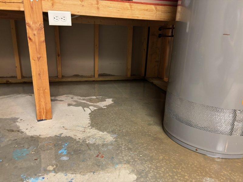 Responded to service call for leaking 40-gallon water heater producing no hot water. Determined existing unit was not repairable and replaced with new 50-gallon natural gas standard vent water heater. Installation included proper drain pan connected to floor drain to prevent future water damage.