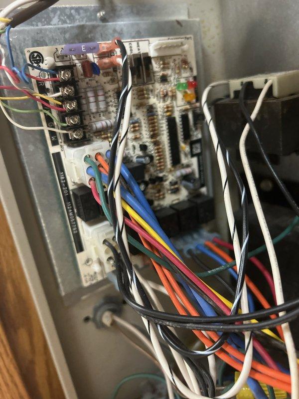 Responded to no-heat call on 25-year-old Gibson LP furnace. Diagnosed multiple component failures including inoperative blower motor that hummed but wouldn't spin, failing gas valve, and heavily soiled burners. Customer had previously attempted repair by replacing ignitor without success. Comprehensive evaluation conducted with circuit board inspection. Recommended complete system replacement due to advanced age and multiple critical component failures.