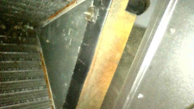 Responded to no heat call for 25-year-old LP furnace with pressure switch error (three flash code). Diagnosed issue with pressure switch tubing, trimmed tubing and reinserted properly into inducer housing. System started successfully and maintained operation through multiple test cycles. Performed visual inspection of heat exchanger and cleaned flame sensor to ensure proper ignition. Unit functioning normally upon completion.