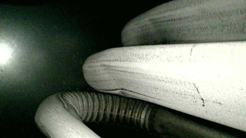 Responded to no heat call for 25-year-old LP furnace with pressure switch error (three flash code). Diagnosed issue with pressure switch tubing, trimmed tubing and reinserted properly into inducer housing. System started successfully and maintained operation through multiple test cycles. Performed visual inspection of heat exchanger and cleaned flame sensor to ensure proper ignition. Unit functioning normally upon completion.