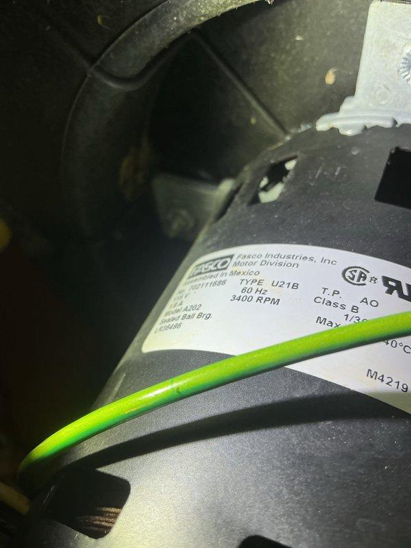 Diagnosed 24-year-old Lennox furnace with no heat complaint. Found seized exhaust fan motor (FASCO U21B) causing burning smell. Inspected heat exchanger with no failures detected, but noted significant system rust. Replaced draft motor to restore heating function. Recommended system replacement due to age and condition; comfort advisor scheduled for follow-up consultation.
