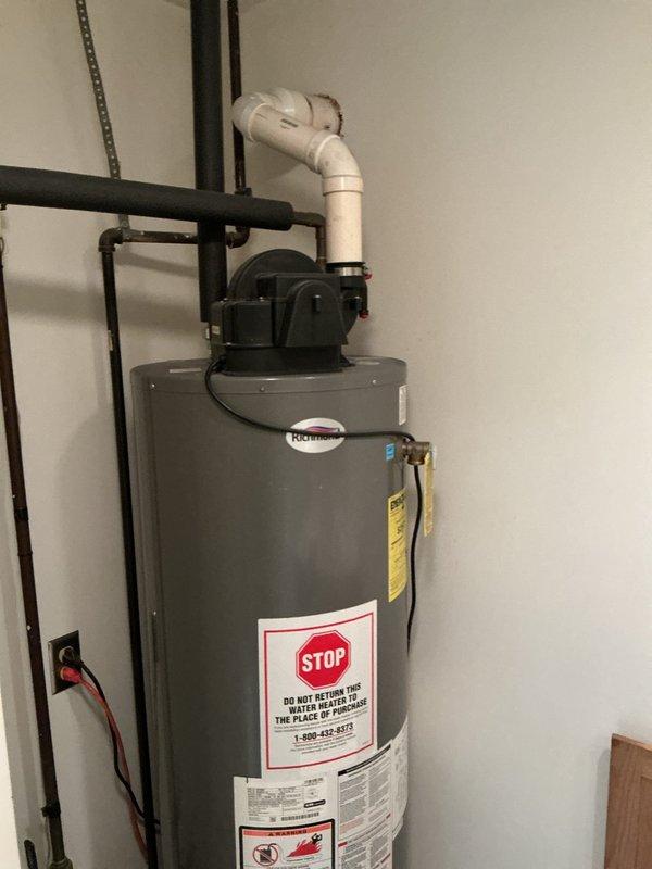 Responded to service call for residential Rheem water heater not producing hot water. Diagnosed issue as gas valve lockout due to activated flammable vapor sensor. Customer had placed toilet cleaning products and brush near vapor sensor, triggering safety shutdown. Contacted technical support to reset gas valve and restore proper functionality. Educated customer on proper storage of cleaning chemicals away from water heater to prevent future lockouts.