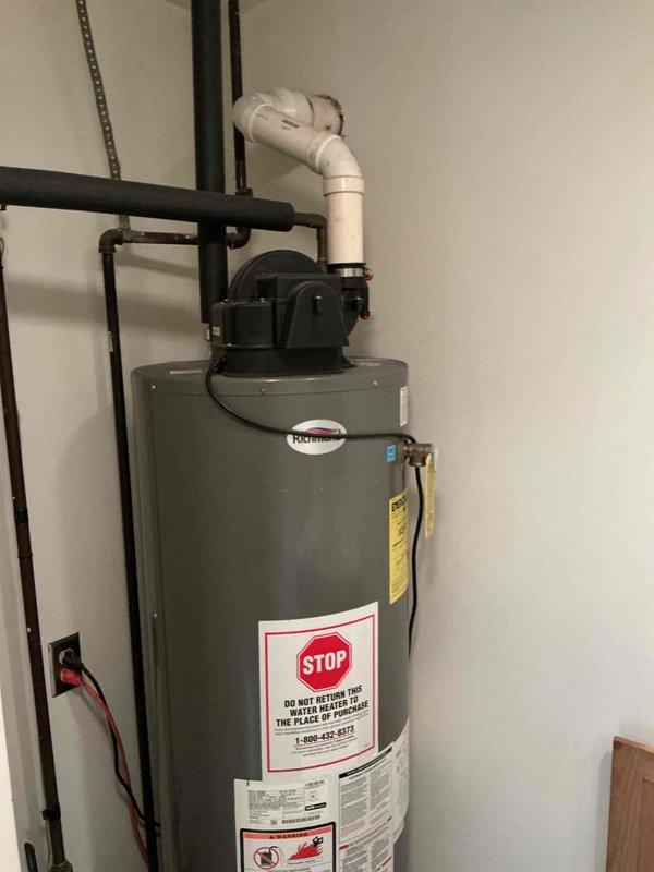 Responded to service call for residential Rheem water heater not producing hot water. Diagnosed issue as gas valve lockout due to activated flammable vapor sensor. Customer had placed toilet cleaning products and brush near vapor sensor, triggering safety shutdown. Contacted technical support to reset gas valve and restore proper functionality. Educated customer on proper storage of cleaning chemicals away from water heater to prevent future lockouts.