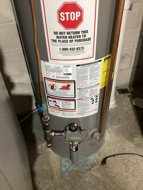 Responded to gas leak concern at water heater. Located leak at pipe fitting using electronic gas detector. Disassembled affected fittings, applied new sealant, and reassembled the connection. Post-repair testing confirmed successful elimination of gas leak, with no further leakage detected.
