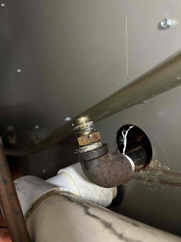 Responded to no-heat call and diagnosed multiple issues with furnace. Found burners with significant rollback, removed and inspected to discover two cracked burners and a gas leak at deteriorated copper flare connection. Replaced damaged burners and performed repair by cutting and re-flaring gas line to restore safe operation.