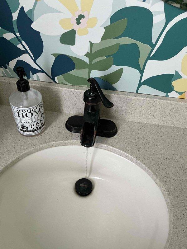 Responded to no-heat call for Trane XE 80 furnace (10+ years old) that was completely non-operational with house temperature below 45°F. Diagnosed system in lockout condition; replaced faulty limit switch and flame sensor to restore proper operation. Provided customer with information regarding potential replacement options due to unit's age.